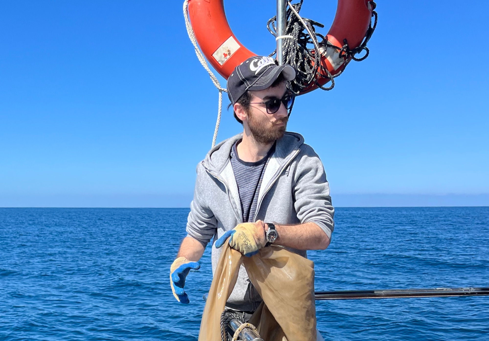 Omri Lapidot at sea, hauling a plankton net